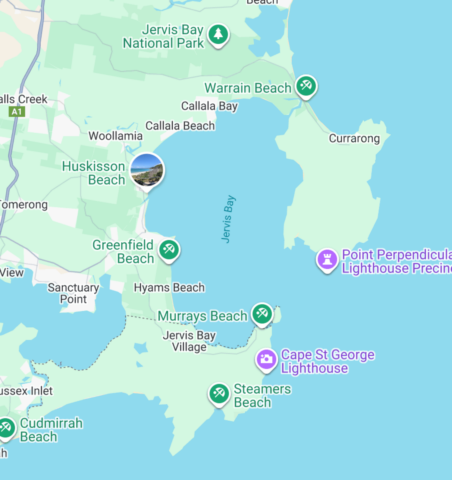 Map of Jervis bay and surrounding coastal areas with various locations marked, including beaches and lighthouses.
